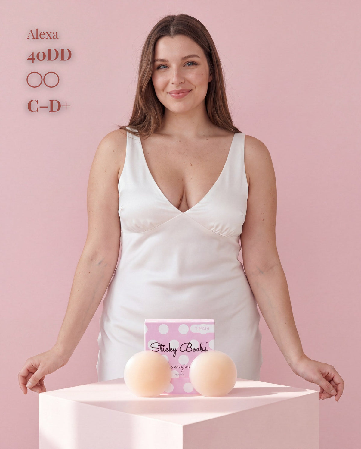 The Original Sticky Boobs, Light shade, size C-D+ (10cm) — model with adhesive nipple covers and box